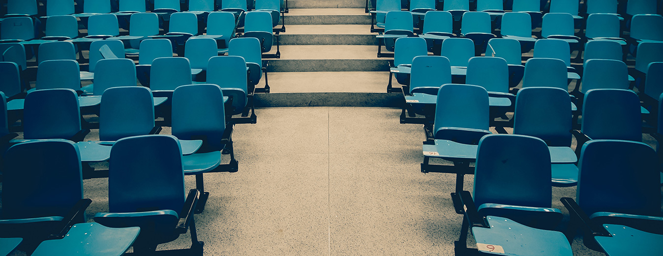 a classroom of empty chairs