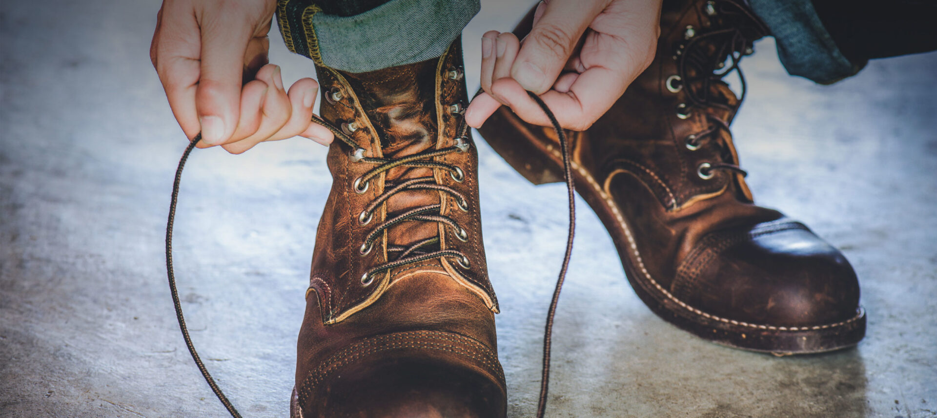 lacing up a boot