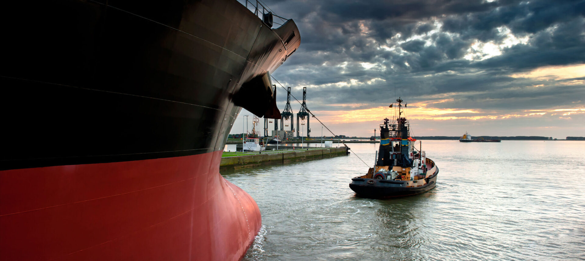 tugboat pulling a ship