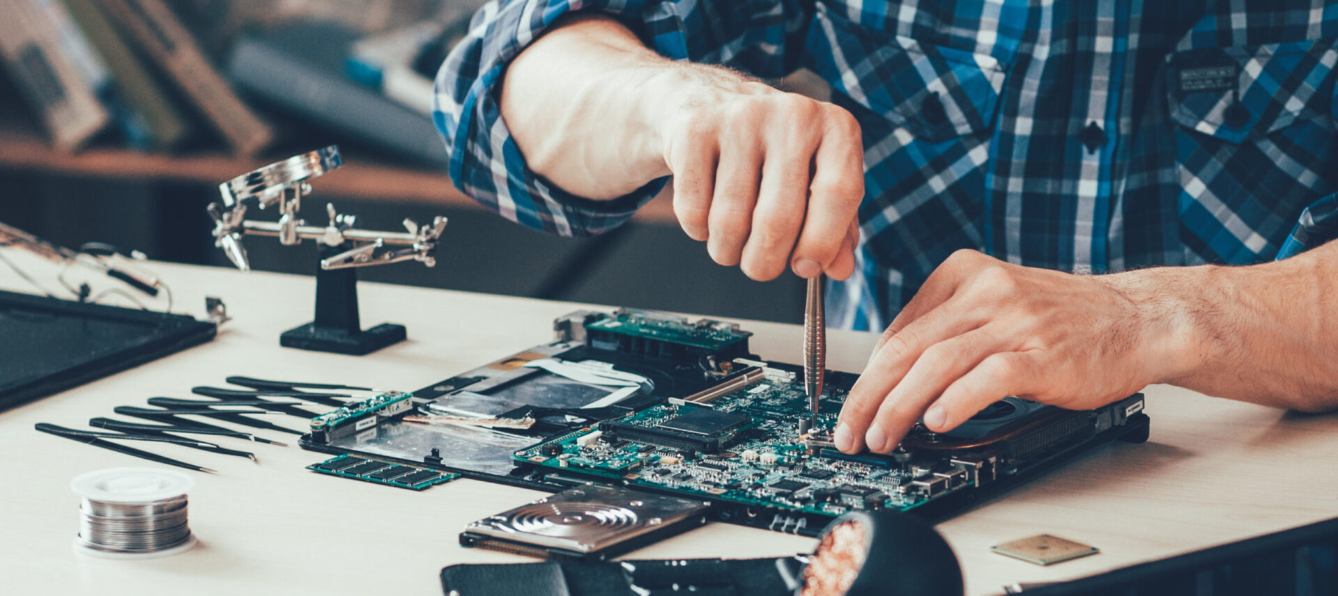 engineer working on a circuit card