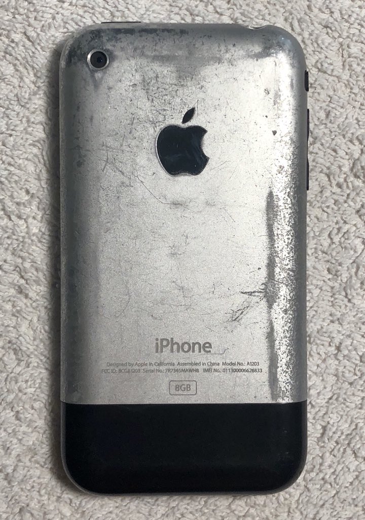 the back of a beat-up old iphone