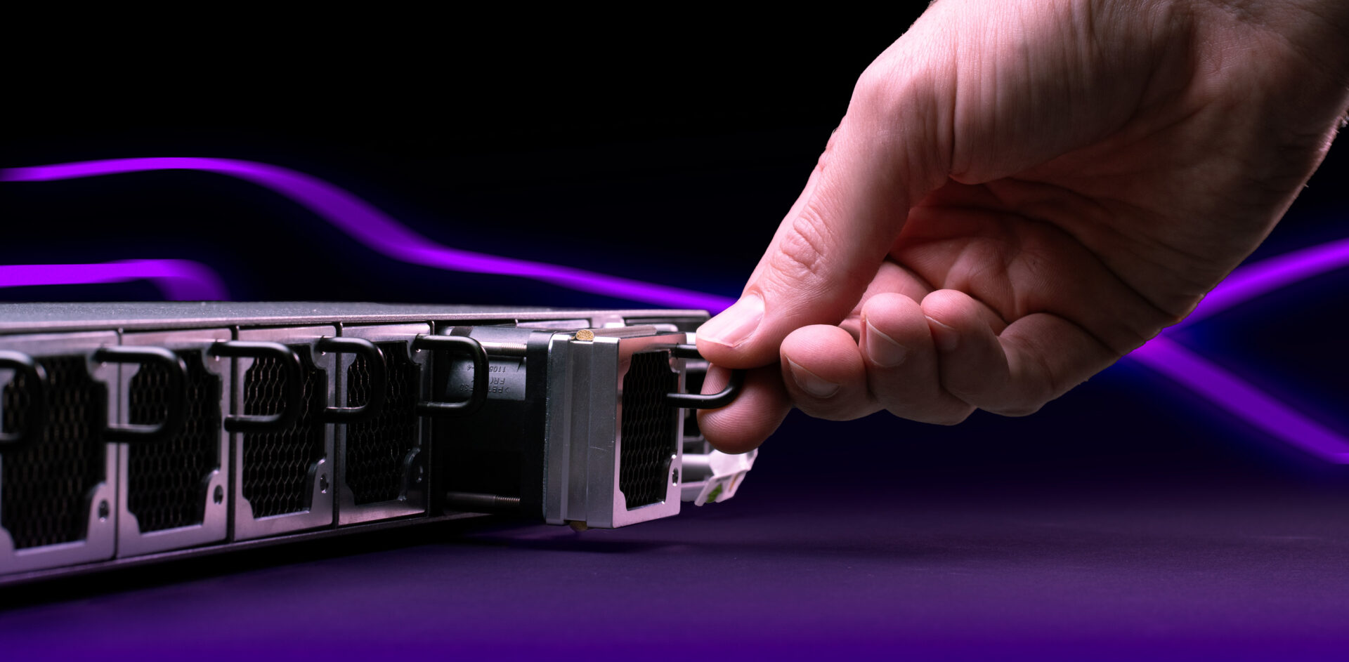 hand installing a fan fru